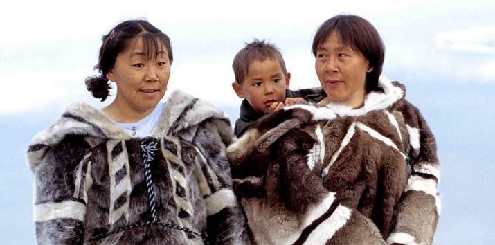 A group of people in fur coats