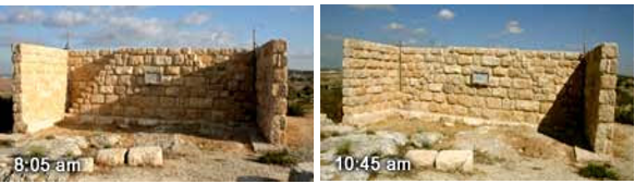 A stone wall with a gate AI-generated content may be incorrect.